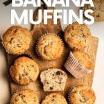 Overhead of gluten-free banana muffins on a wooden cutting serving board. A text overlay reads, "Almond Flour Banana Muffins."