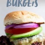 Close-up shot of a Garden Onion Burger on a cutting board, with a text overlay