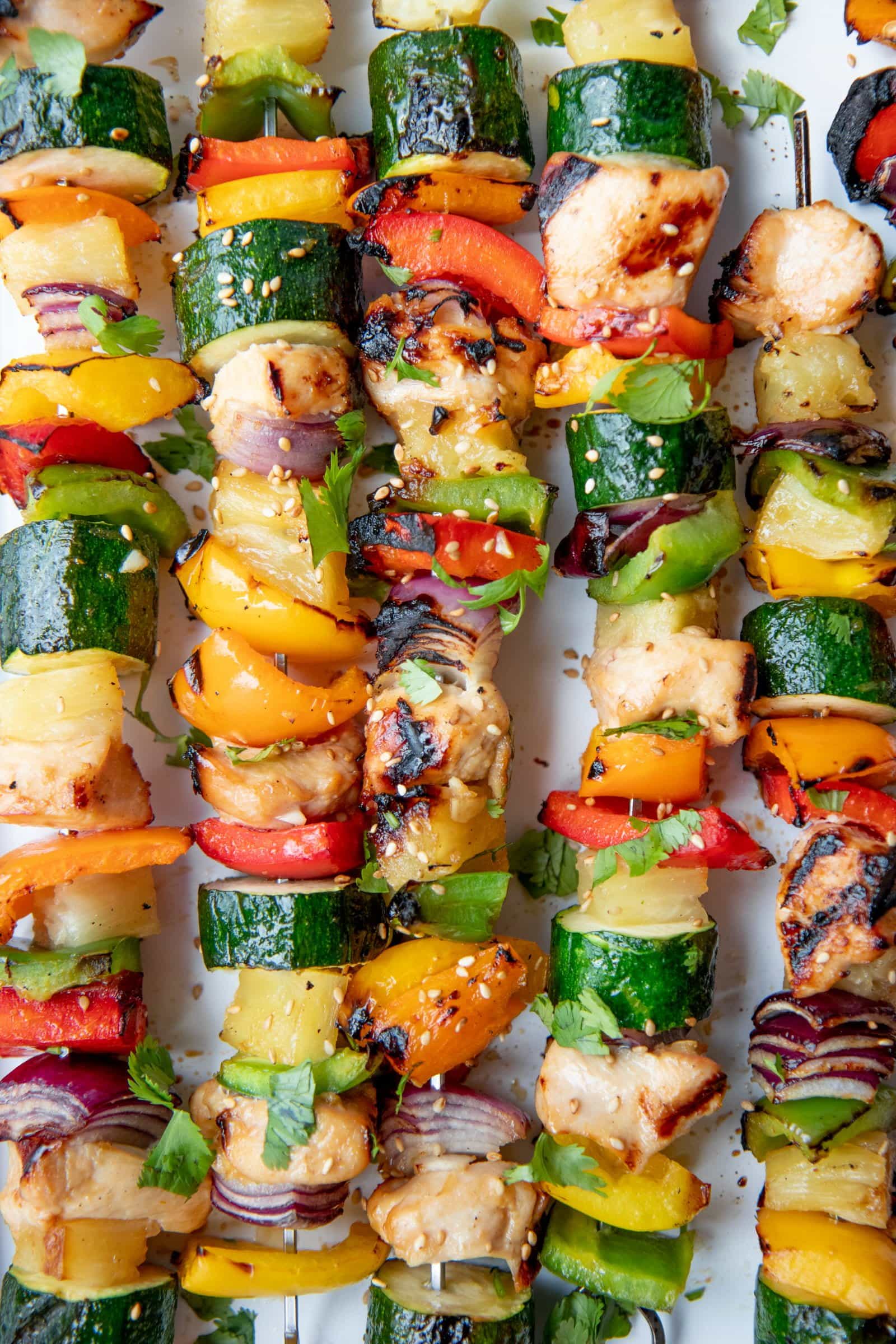 Finished Grilled Hawaiian Chicken Kabobs on a white background