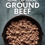 Overhead of browned mince in a cast iron skillet. A text overlay reads, "Cooking 101: How to Cook Ground Beef."