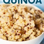 Close view of fluffy quinoa grains in a white bowl. A text overlay reads, "How to Cook Quinoa: Oven and Stove Top."