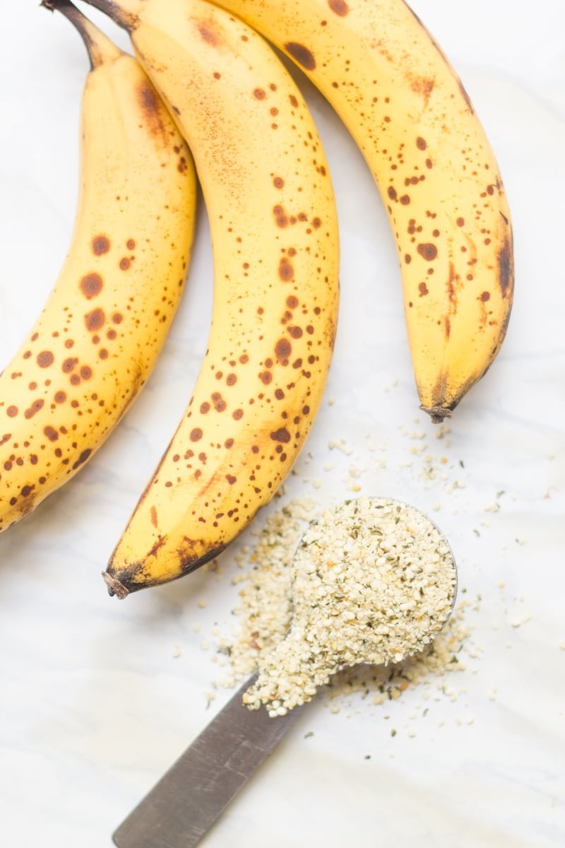 Ingredients to make muffins sit together - bananas and hemp seed