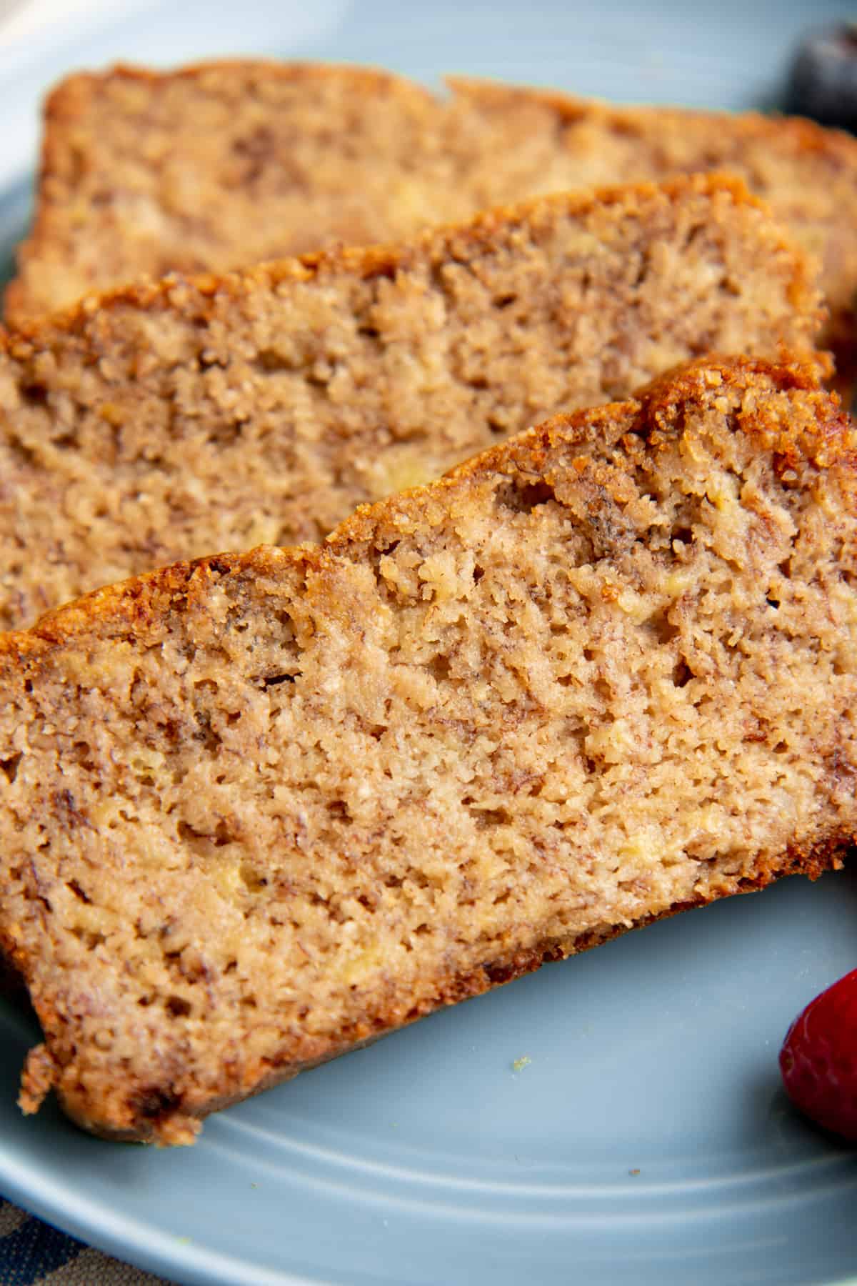 Close up on a slice of paleo banana bread.