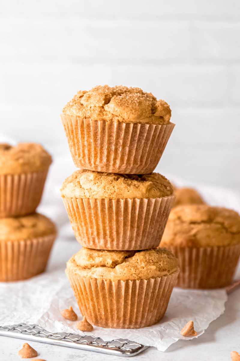 Three peanut butter muffins stacked one atop the other.