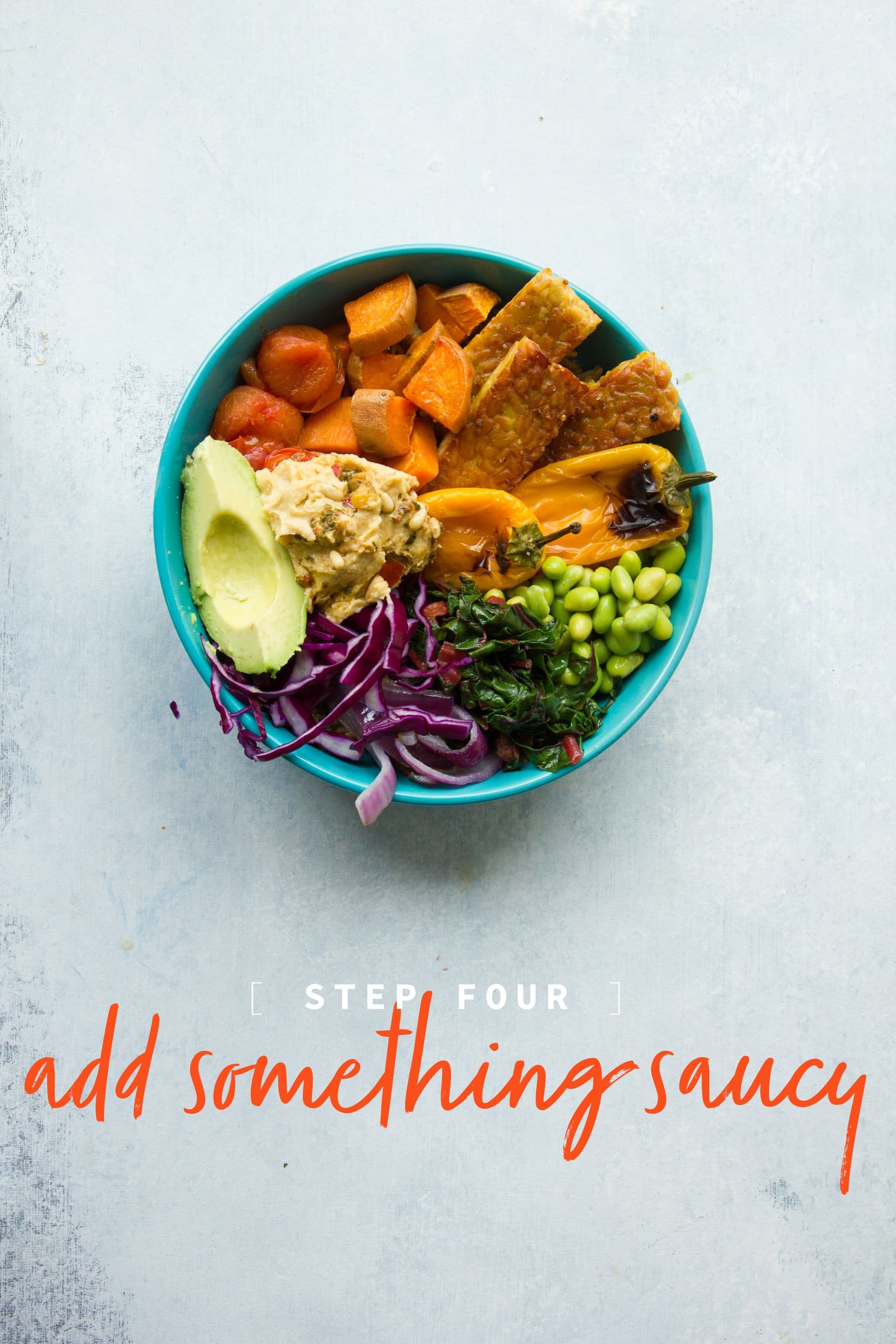 A grain bowl piled high with veggies, tofu, and hummus. A text overlay reads "Step 4: Add something saucy."