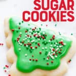 Cut out sugar cookies frosted to look like Christmas trees, with sprinkles on the frosting. A text overlay reads "Perfect Frosted Sugar Cookies."