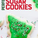 Sugar cookies cut out and frosted to look like Christmas trees. A text overlay reads "Perfect Frosted Sugar Cookies."