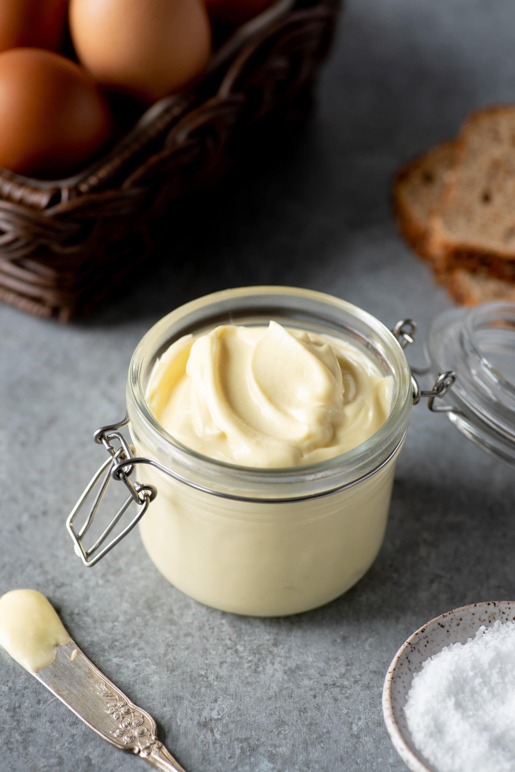 Side-angle shot of Homemade Mayo in a glass jar