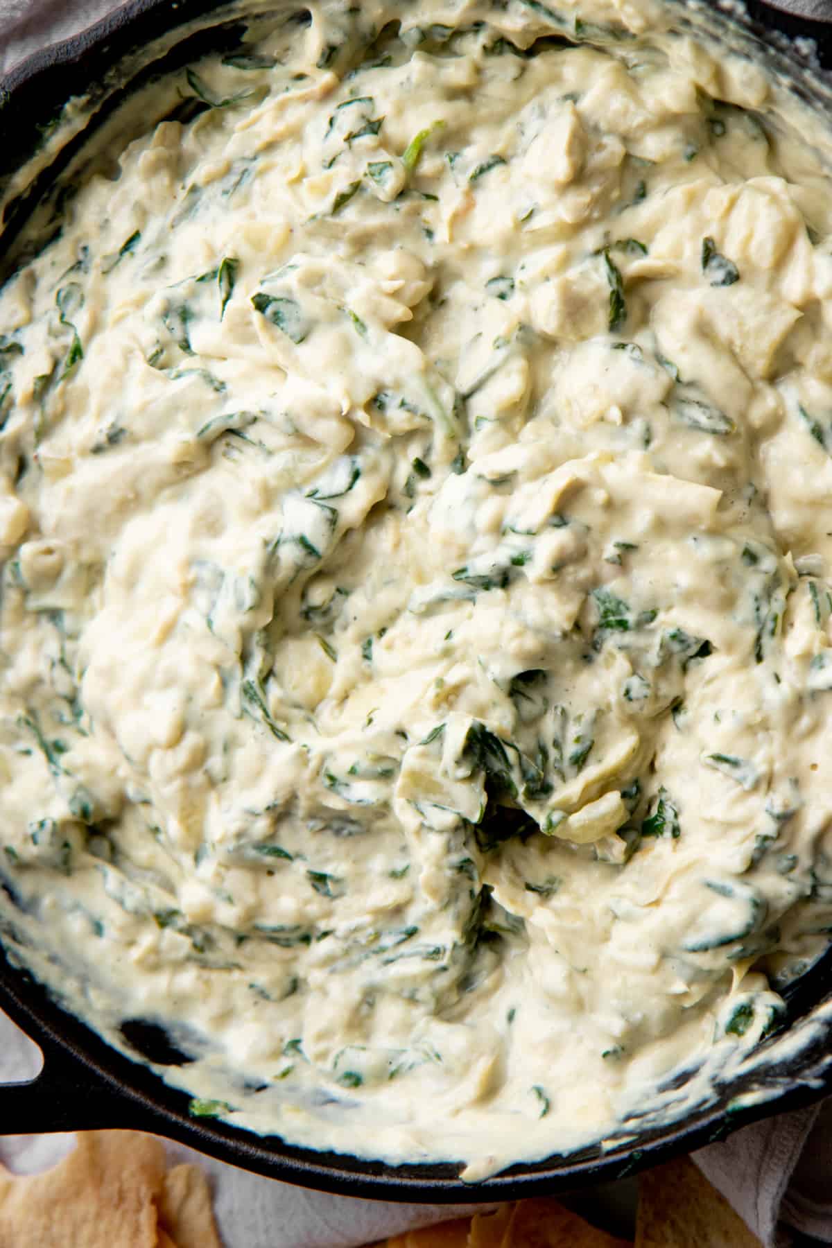 Close up of vegan spinach artichoke dip.