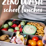 Hands holding a filled bento-style lunch box for a waste-free lunch. A text overlay reads "How to Pack Zero Waste School Lunches."